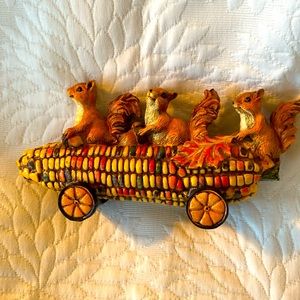 Whimsical corn cob cart with 3 little squirrels driving it!  7”long by 3.5”tall